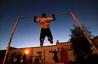 2012-02-28T220023Z_1604373553_GM1E82T0GT701_RTRMADP_3_WEIGHTLIFTING (4).jpg