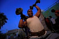 2012-02-28T215620Z_340123983_GM1E82T0FY801_RTRMADP_3_WEIGHTLIFTING (7).jpg